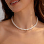 Model showcasing Adjustable Classic Pearl Necklace