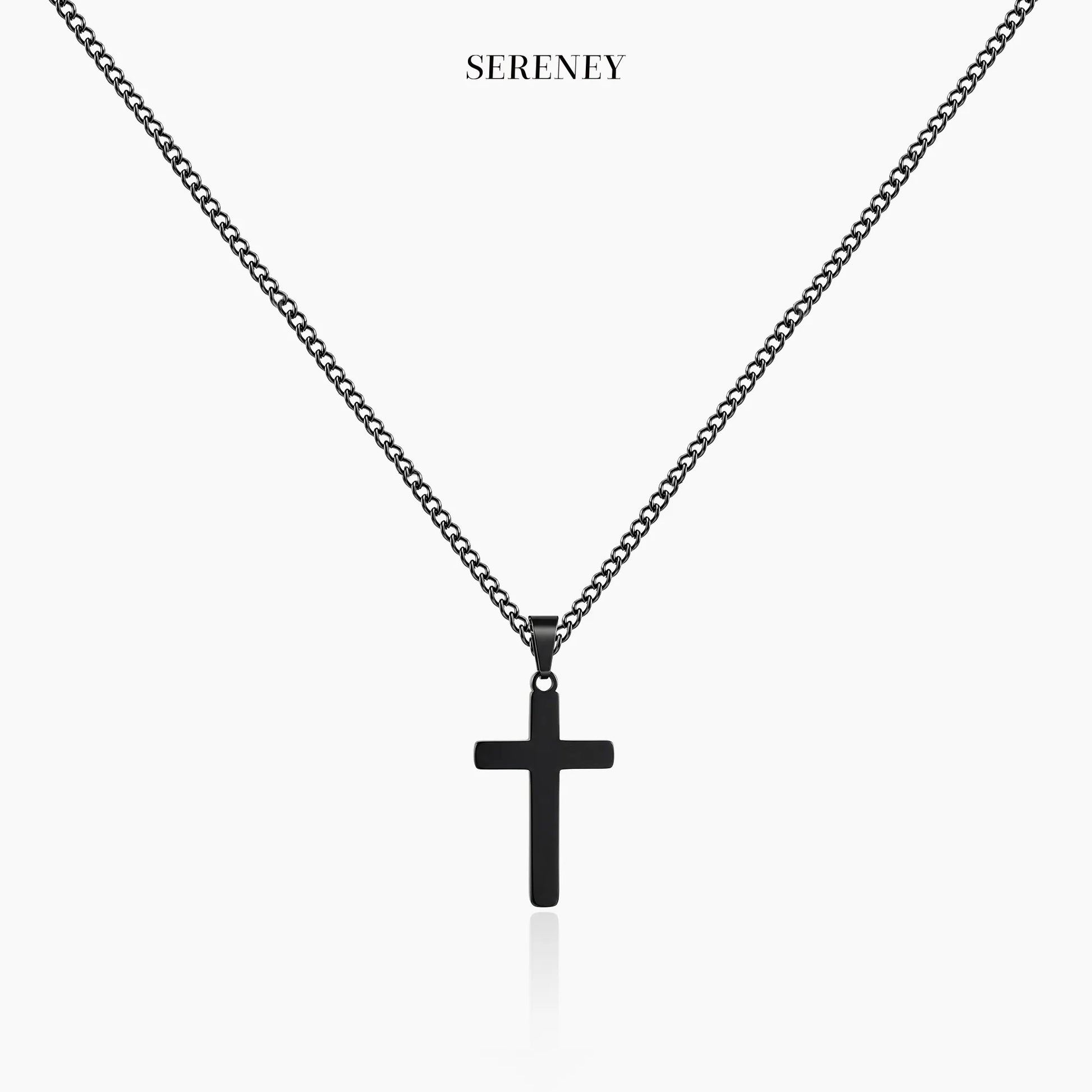 Black cross necklace on display