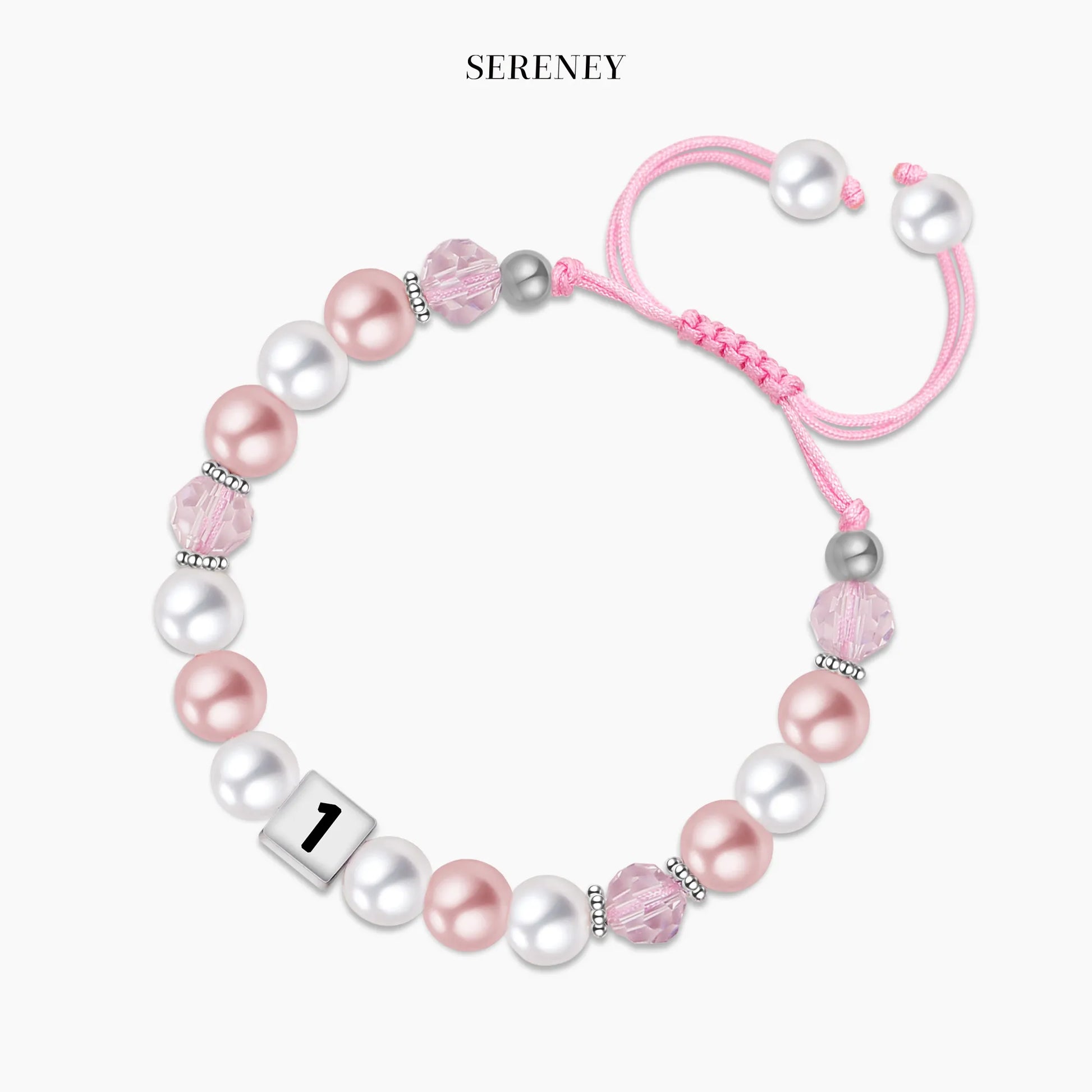 Pink pearl bracelet for first birthday with vendor name