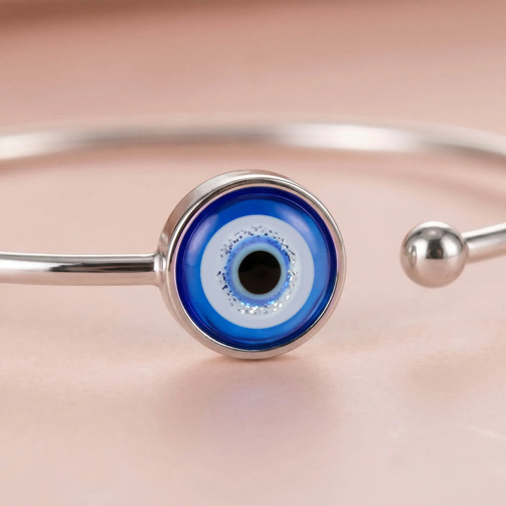 Close-up of Evil Eye Protection Bangle showing blue evil eye detail