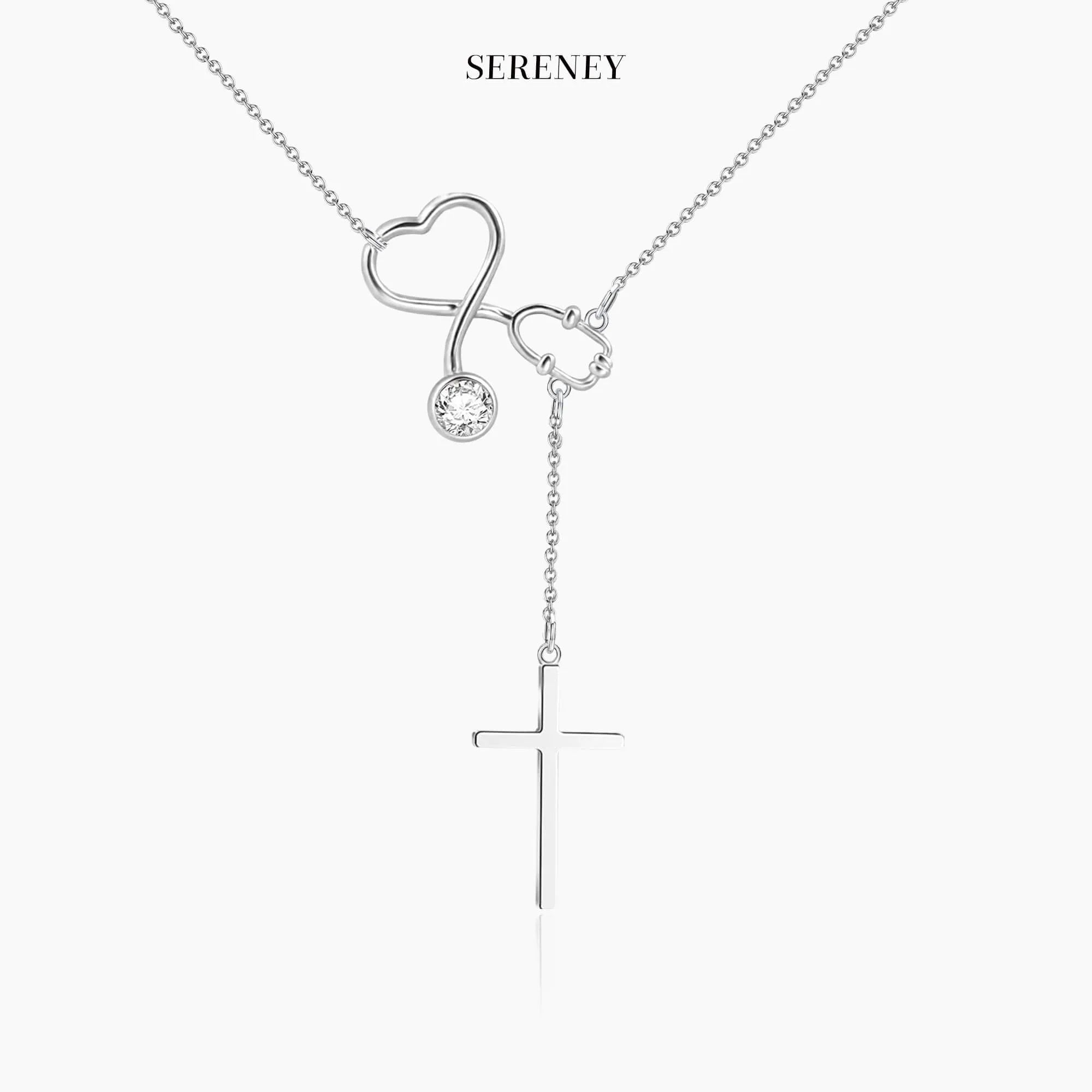 Heart Stethoscope Cross Necklace on display