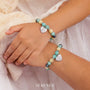 Two Grandma & Granddaughter Bracelets worn on hands, showcasing their bond