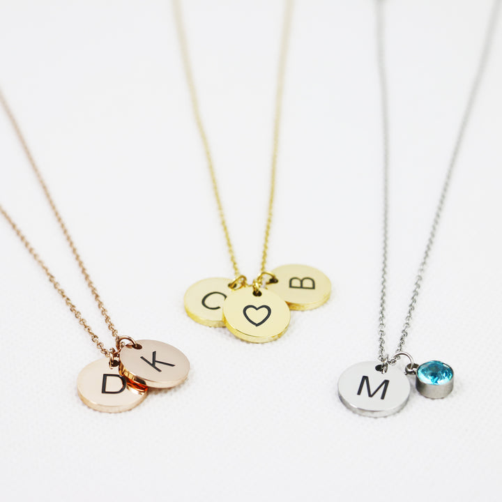 Personalized charm necklaces with initials and birthstones