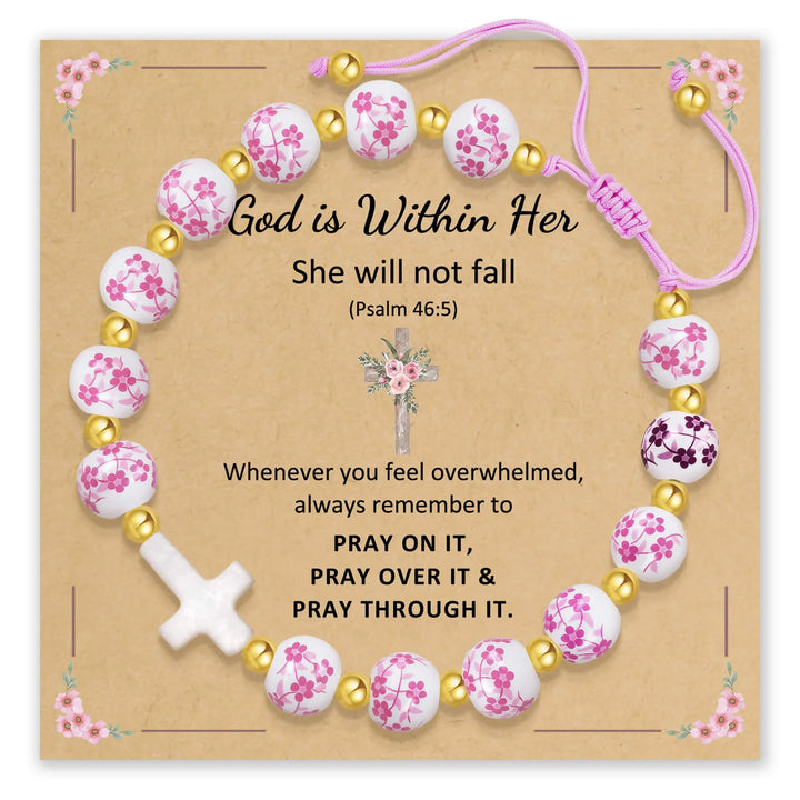 Bracelet with pink floral beads and a white cross