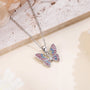 Butterfly pendant necklace with silver-tone chain on light stone base, colorful enamel