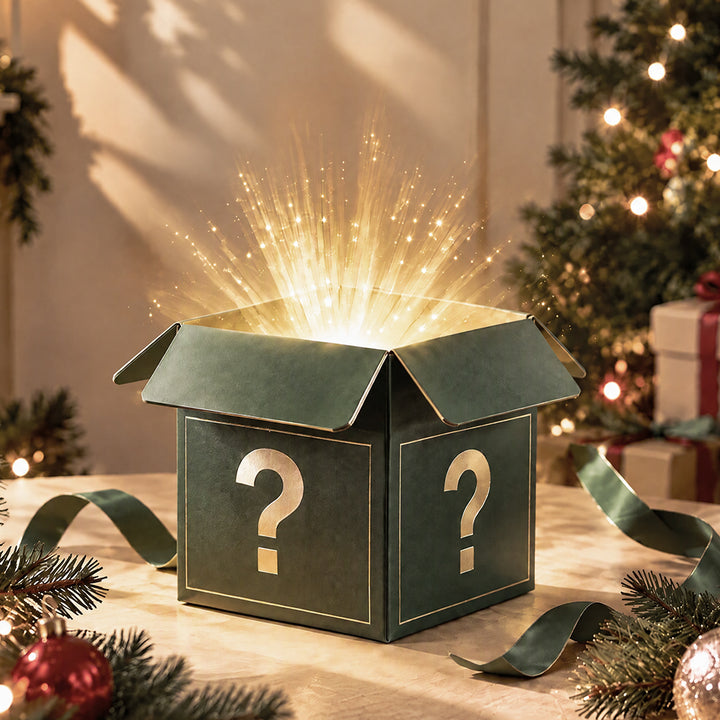 Holiday mystery gift box set with question-mark icons, green and black design