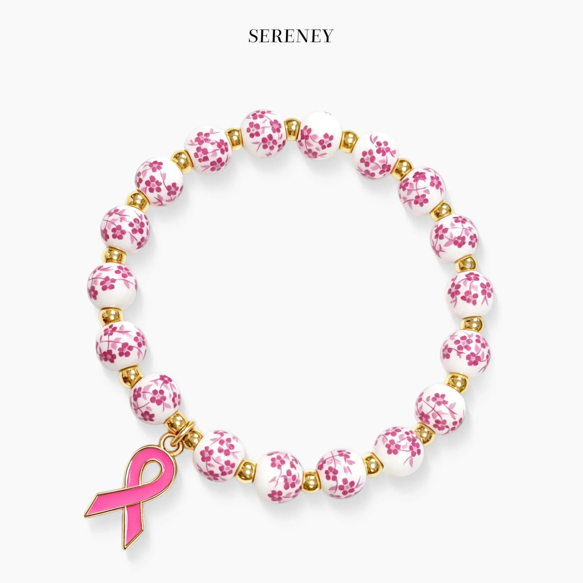 Pink ribbon charm beaded bracelet with white beads, pink floral pattern, gold spacers