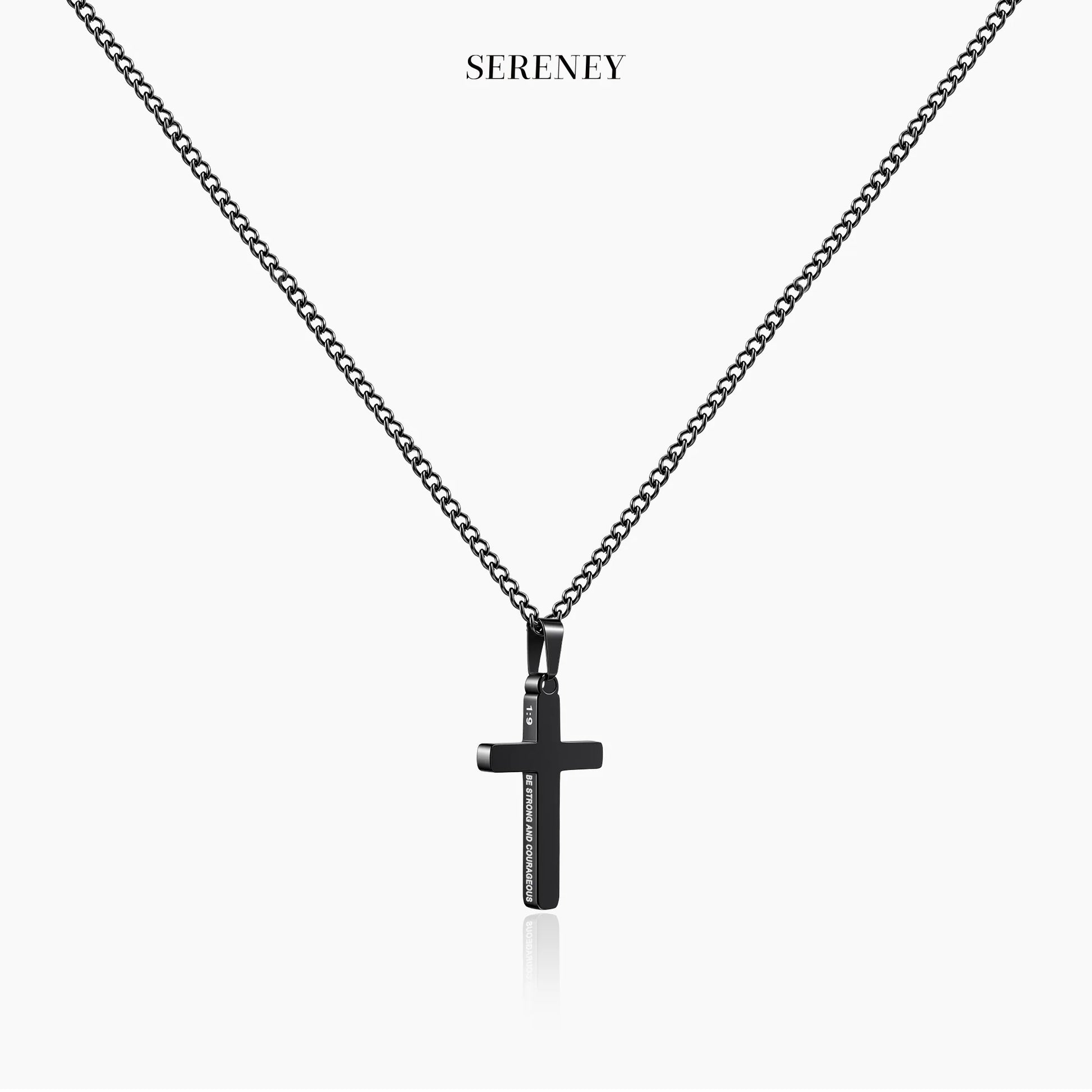 Black stainless steel cross necklace displayed on a white background