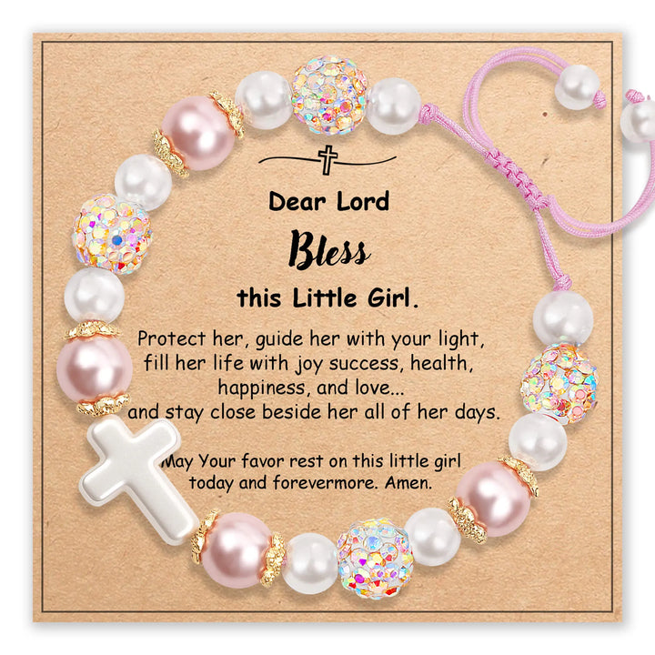 Bracelet with white cross charm and pink simulated pearls