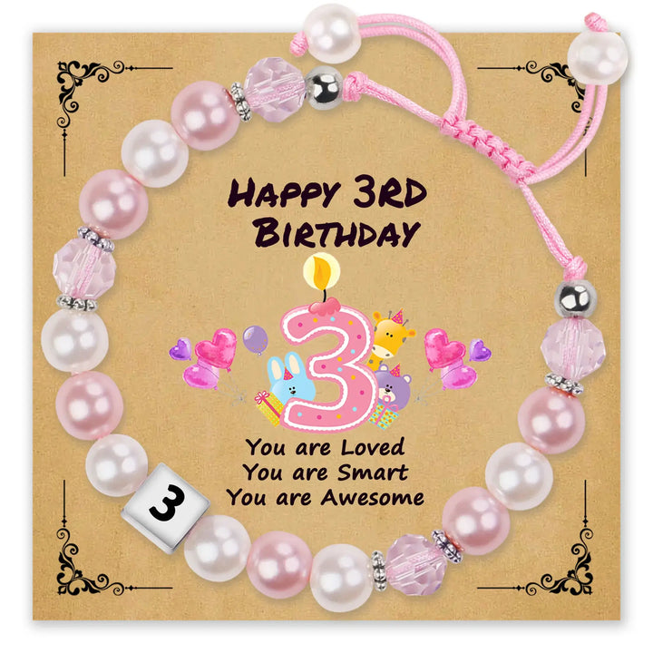 Pink pearl bracelet for third birthday with decorative card