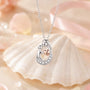 Heart mother necklace pendant with crystal-studded frame and rose-gold heart inside