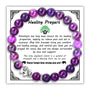 Amethyst bead bracelet with elephant charm on decorative Healing Prayers card