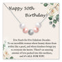 Birthday card featuring five pearls and floral design