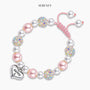 Magical Zebra Jasper Birthday Bracelet with heart pendant for 5th birthday on display