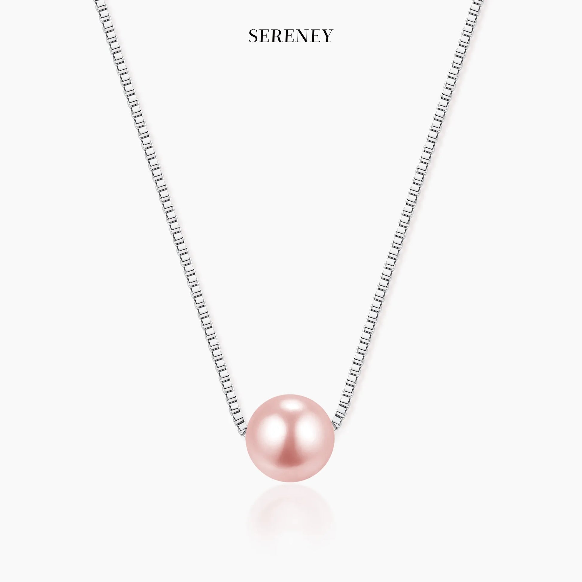Pink crystal pearl necklace displayed on a light background