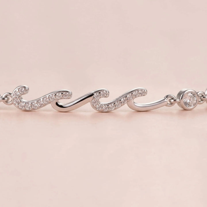 Close-up of wave bracelet featuring cubic zirconia stones