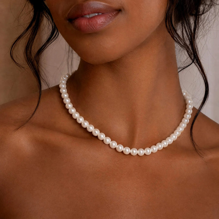 Model wearing Adjustable Classic Pearl Necklace close-up