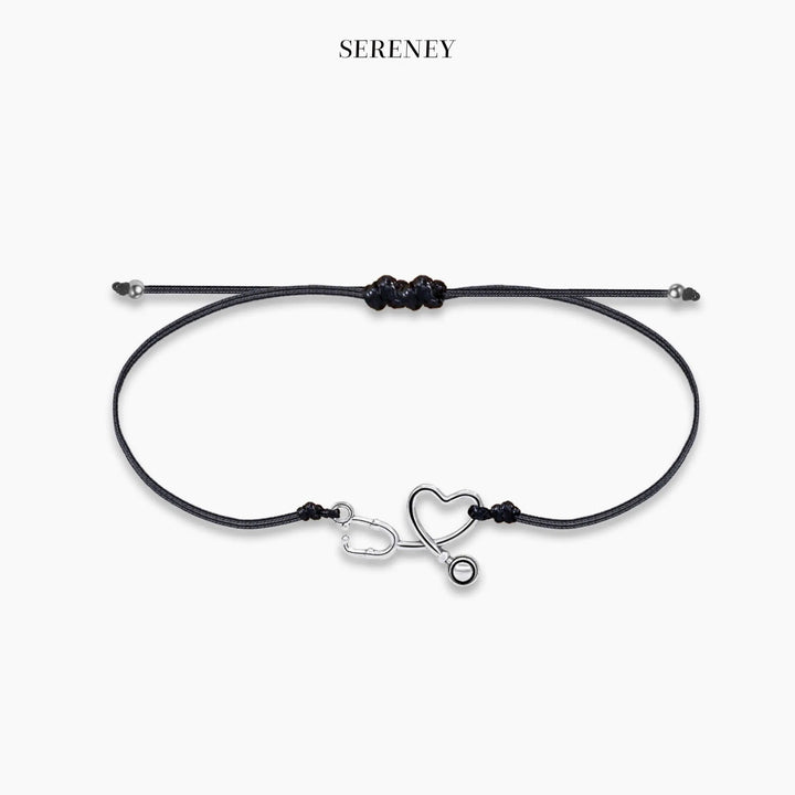 Adjustable string bracelet featuring a heart-shaped stethoscope