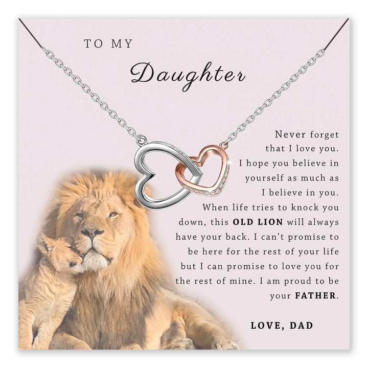 Necklace with interlocking hearts on a card with lion imagery