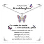 Butterfly pendant necklace shown on a message card with butterfly artwork