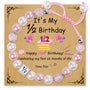 Pink pearl bracelet for half birthday with decorative card