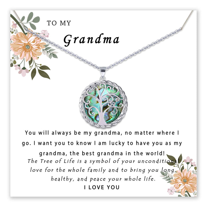 Necklace with Tree of Life pendant on floral background