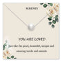 Necklace presentation card with a pearl and floral design