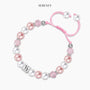 Pink pearl bracelet for half birthday with vendor name